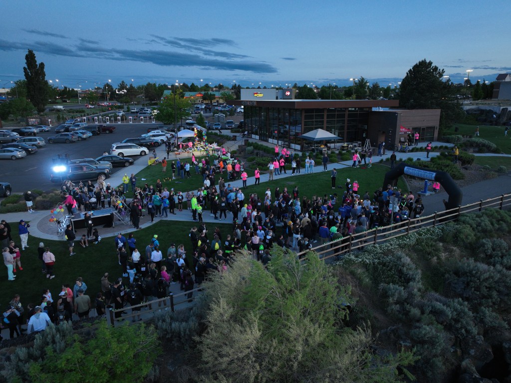 People gathered on the Canyon Rim Trail for a 5k.